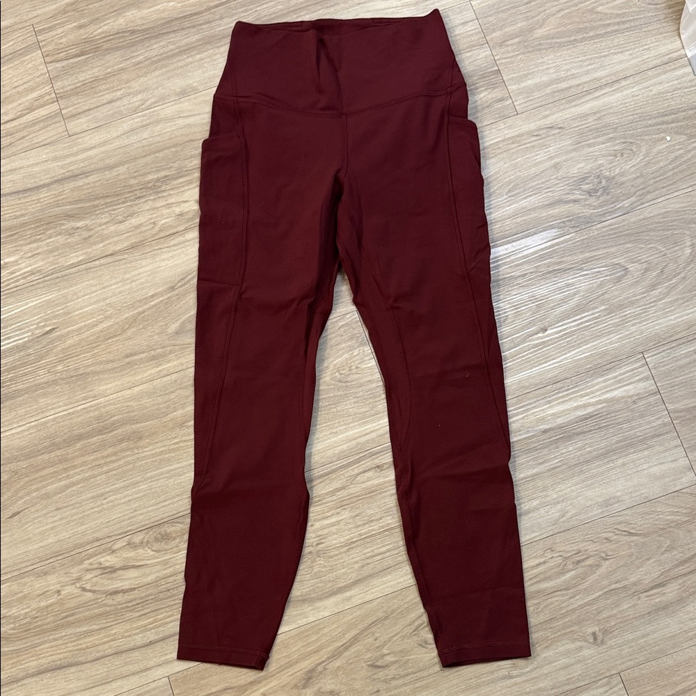 Lululemon maroon align Leggings (pockets/25”) + energy bra (both size 6)